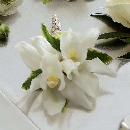 White Mini Cymbidium Boutonniere – LA DEANNE'S FLORIST, Cuthbert GA